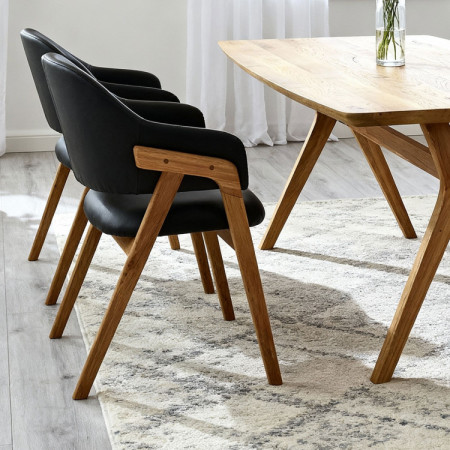 Dubový jedálenský stôl oválny 180 × 90 cm a stoličky Beny čierna