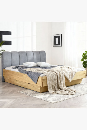 Masívna posteľ 180 x 200 s úložným priestorom a látkovým čelom