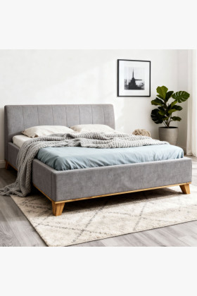 Manželská posteľ na nožičkách s úložným priestorom 180 x 200 cm